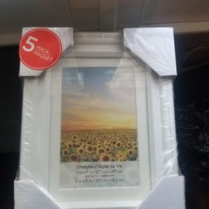 Brand new in package white 5x7 picture  frames.